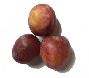 three opal plums with red and green colourings